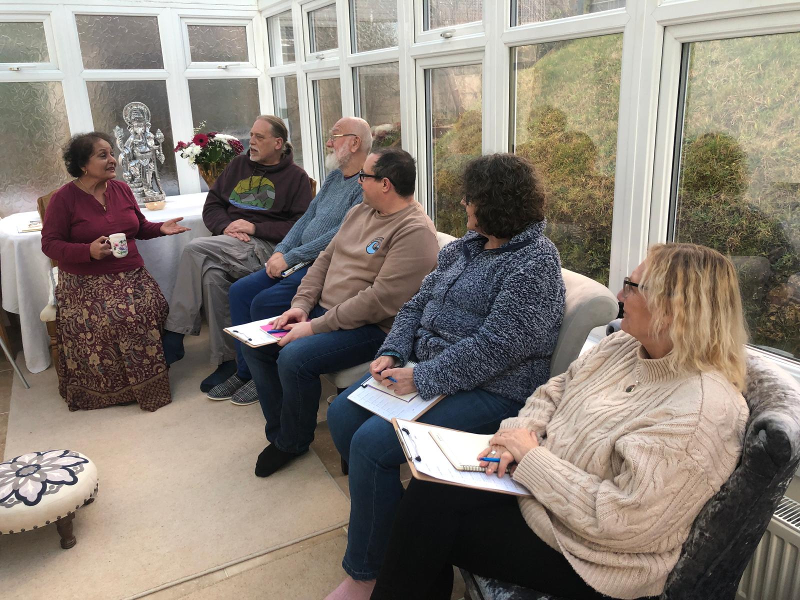 Alka leading an Ayurveda workshop with a small group